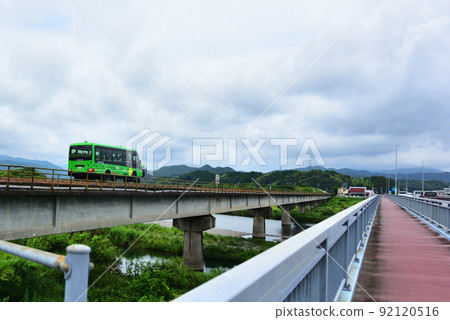 Asa Kaigan Railway dmv running on the Kaifu River Bridge 92120516