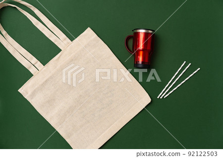 Textile shopping bag and coffee cup flat lay 92122503