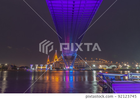 Bhumibol Bridge, Chao Phraya River Bridge. Turn on the lights in many colors at night. Bhumibol Bridge, Chao Phraya River Bridge. Turn on the lights in many colors at night. 92123745