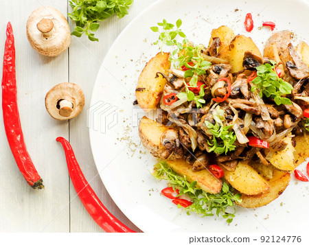 Potatoes with champignons 92124776