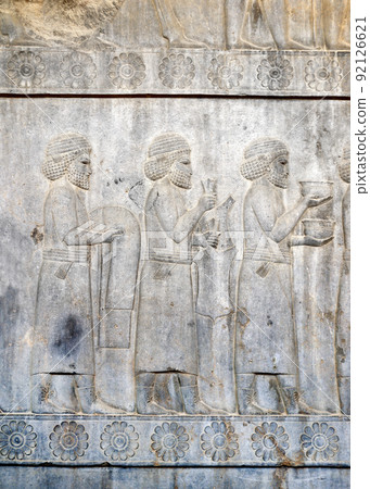 Ancient wall with bas-relief with assyrian foreign ambassadors with gifts and donations, Persepolis, Iran Ancient wall with bas-relief with assyrian foreign ambassadors with gifts and donations, Persepolis, Iran 92126621