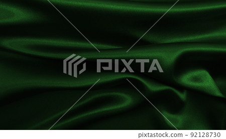Smooth elegant green silk or satin luxury cloth texture as abstract background. Luxurious background design Smooth elegant green silk or satin luxury cloth texture as abstract background. Luxurious background design 92128730