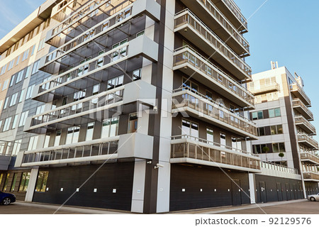 European modern apartment residential area, Urban landscape in city, Facade of residential building or business office European modern apartment residential area, Urban landscape in city, Facade of residential building or business office 92129576