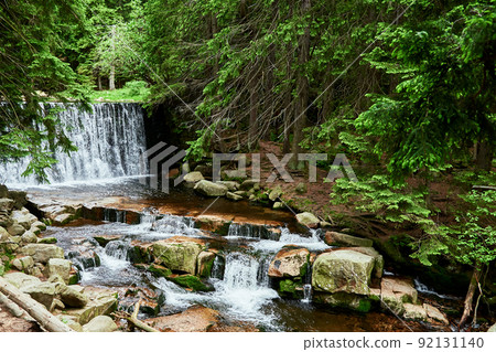Waterfall on Lomnica river in Karpacz mountains in Poland, Beautiful nature landscape 92131140