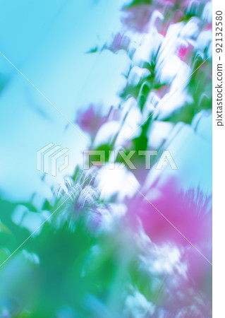 Glowing blurred colorful nature background with sunshine Glowing blurred colorful nature background with sunshine 92132580