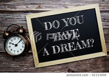 Do You Have A Dream? word with alarm clock on wooden background 92133000