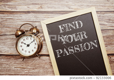 Find Your Passion word with alarm clock on wooden background Find Your Passion word with alarm clock on wooden background 92133006
