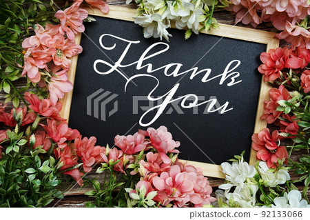 Thank You typography text written on wooden blackboard with flower bouquet decorate on wooden background Thank You typography text written on wooden blackboard with flower bouquet decorate on wooden background 92133066