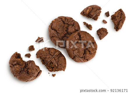 chocolate cookies broken isolated on white background with full depth of field. Top view. Flat lay chocolate cookies broken isolated on white background with full depth of field. Top view. Flat lay 92136171