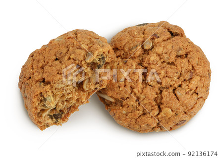 oatmeal cookies with flax, pumpkin and sunflower seeds isolated on white background with full depth of field. Top view. Flat lay 92136174