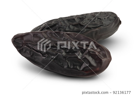 Tonka bean isolated on white background with full depth of field. Bean of Dipteryx odorata 92136177