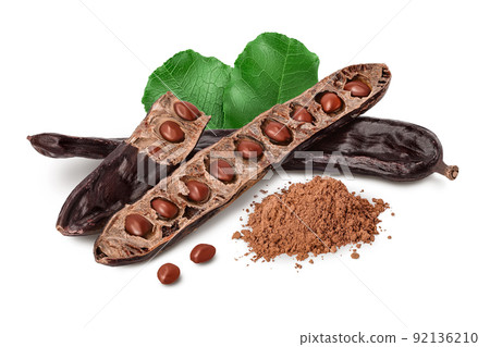 Carob pod and powder isolated on white background with full depth of field. 92136210