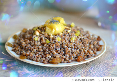 Vintage bowl with traditional kutia with poppy seed.  92136312
