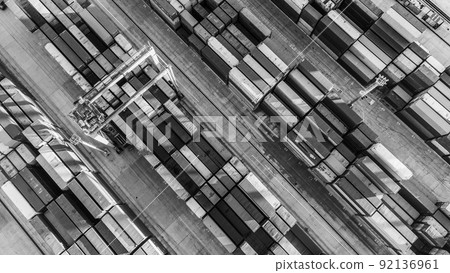 Aerial view of shipping container port terminal. Colourful pattern of containers in harbor. Maritime logistics global inport export trade transportation. Aerial view of shipping container port terminal. Colourful pattern of containers in harbor. Maritime logistics global inport export trade transportation. 92136961