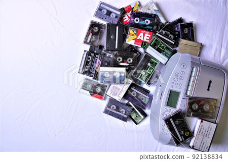 Radio cassette player and a large amount of cassette tape 92138834