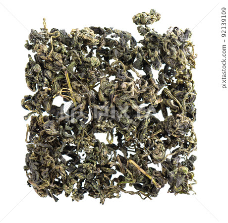 Dry gynostemma pentaphyllum leaf isolated on white blackground. Jiaogulan or Miracle grass. Chinese herbal tea. Top view. 92139109