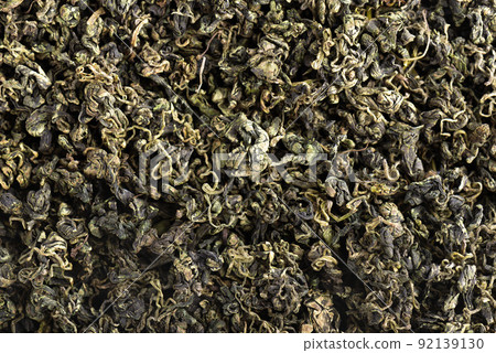 Dry gynostemma pentaphyllum leaf blackground. Jiaogulan or Miracle grass. Chinese herbal tea. Top view. 92139130