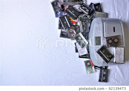 Radio cassette player and a large amount of cassette tape 92139473