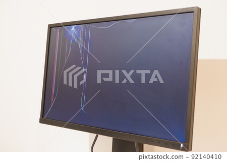Broken LCD monitor. Cracked LCD Screen. Broken screen of a liquid crystal display, computer monitor. Broken LCD monitor. Cracked LCD Screen. Broken screen of a liquid crystal display, computer monitor. 92140410