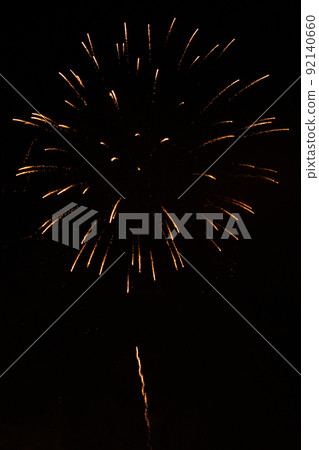 Fireworks exploding against black background Fireworks exploding against black background 92140660