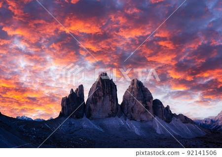 Incredible view of the Three Peaks of Lavaredo on sunset time 92141506