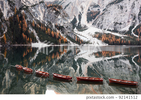 Picturesque landscape with famous lake Braies in autumn Dolomites 92141512