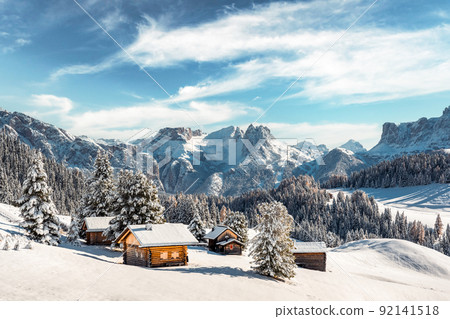 Picturesque landscape with small wooden house on meadow Alpe di Siusi Picturesque landscape with small wooden house on meadow Alpe di Siusi 92141518