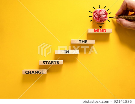 Change starts in the mind symbol. Concept words Change starts in the mind on wooden blocks on a beautiful yellow table yellow background. Business motivational and change starts in the mind concept. 92141886