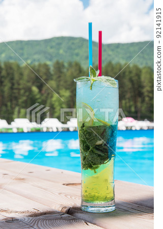 Mojito cocktail with lime and mint in highball glass Mojito cocktail with lime and mint in highball glass 92141915