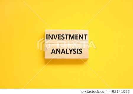 Investment analysis symbol. Wooden blocks with concept words Investment analysis on beautiful yellow background. Business investment analysis concept. Copy space. Investment analysis symbol. Wooden blocks with concept words Investment analysis on beautiful yellow background. Business investment analysis concept. Copy space. 92141925