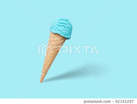 Blue ice cream scoop in cone 92142297