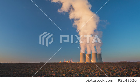 Nuclear Power Plant Temelin, Cooling towers with white water vapor in the landscape, Czech republic Nuclear Power Plant Temelin, Cooling towers with white water vapor in the landscape, Czech republic 92143526