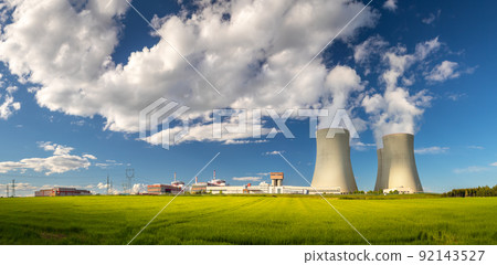 Nuclear Power Plant Temelin, Cooling towers with white water vapor in the landscape, Czech republic 92143527