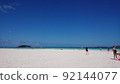 Blue sky and white beach 92144077