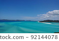The blue sky and the sea of the emerald green 92144078