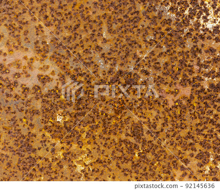 textured rusty surface of old iron dirty brown with light intersperses, metal embossed background aged and exposed to moisture and time textured rusty surface of old iron dirty brown with light intersperses, metal embossed background aged and exposed to moisture and time 92145636