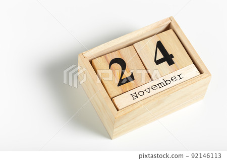 Wooden cubes with date on white background. 24th of November 92146113