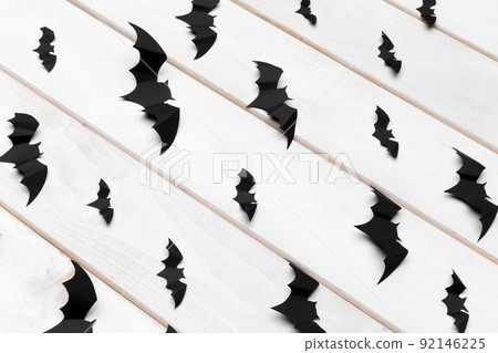 halloween and decoration concept - paper bats flying 92146225