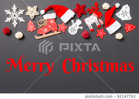 Merry Christmas text. New Year decorations on black background. Merry Christmas concept with empty space for your design 92147763