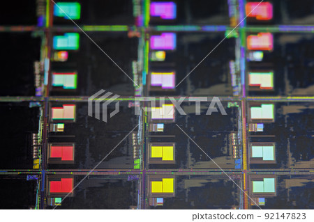 Silicon wafer with microchips used in electronics for the fabrication of integrated circuits. Full-frame high-tech macro background. Silicon wafer with microchips used in electronics for the fabrication of integrated circuits. Full-frame high-tech macro background. 92147823