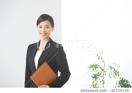 A woman in a suit A woman in a suit 92150110