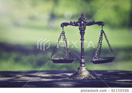 Balance and green blur background Balance and green blur background 92150588