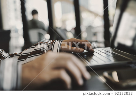 Women handling personal computers Women handling personal computers 92152032