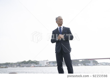 Japanese business port fishing port purchasing sea middle-aged man in a suit Japanese business port fishing port purchasing sea middle-aged man in a suit 92153598