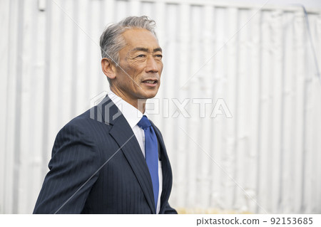 Japanese business port fishing port purchasing sea middle-aged man in a suit Japanese business port fishing port purchasing sea middle-aged man in a suit 92153685