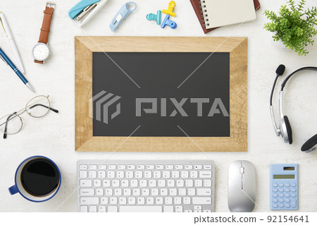 Black board on the desk, bird's-eye view, unmanned Black board on the desk, bird's-eye view, unmanned 92154641