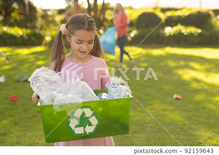 Image of caucasian girl with box for waste recycling Image of caucasian girl with box for waste recycling 92159643