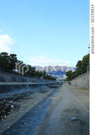 Scenery of the river flowing through the streets of Japan: A row of pine trees on the Ashiya River in Ashiya City, Hyogo Prefecture 92159914