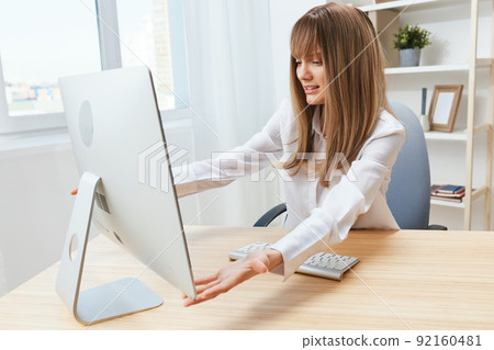 Shocked excited blonde businesswoman touch screen confused after computer software crash error at workplace in modern office. Upset director work online in financial corporation. Copy space Shocked excited blonde businesswoman touch screen confused after computer software crash error at workplace in modern office. Upset director work online in financial corporation. Copy space 92160481