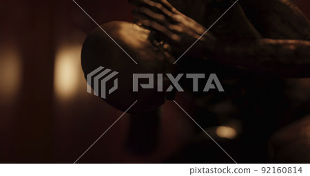 Image of human like monster in dark tunnel being stunned 92160814